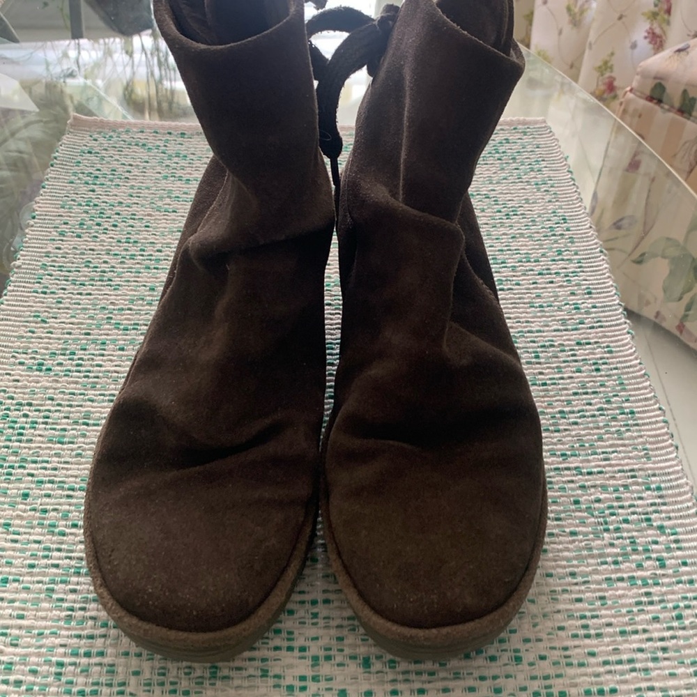 Fly London army green boots.